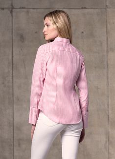 Introducing our stunning Raspberry Stripe shirt, crafted from the softest cottons in the world. The dreamy fabric is made with specially twisted yarns in the placed stripes, for an absolutely unique look and then peached to achieve a dreamy softness against the skin. Abound with thoughtful details such as faux mother-of-pearl flat buttons and our signature, fully-fashioned European flare cuff. A gorgeous and versatile day piece, it can be dressed up or down. • Modern Fit• 100% Cotton• Spread Col Elegant Striped Cotton Tops, Elegant Striped Cotton Blouse, Elegant Pinstripe Cotton Top, Fitted Dress Shirts, Fully Fashioned, Stripe Shirt, Wide Cuff, Fit Dress, Modern Fit