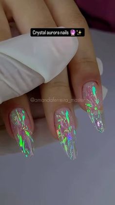 Nail art 💅 Manicure on Instagram: "By @amandaferreira_master 🔮✨Crystal aurora nails 💅 

#CrystalAuroraNails #SparklingNails #NailTutorial #AuroraNailDesign #LuxuryNails #GlamorousNails #NailArtStepByStep #AuroraEffectNails #ShimmerNailDesign #GlitterNails #ElegantNailArt #FestiveNails #CrystalNailTutorial #WinterNails #ChicNailDesign #SparkleManicure #HolidayNailArt #DIYNailTutorial #CrystalEffectNails #ShinyNails #LuminousNails #GlamNailIdeas #StunningNails #AuroraSparkleNails #FestiveManicure #LuxuryNailArt #ChristmasNails #GlitteringNails #DazzlingNails #DreamyNailArt"