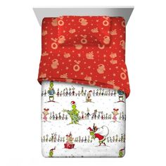 the grinch christmas bedding set with red sheets and pillowcases is shown