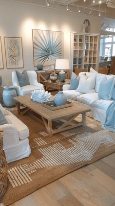 a living room filled with lots of furniture and decor on top of a wooden floor