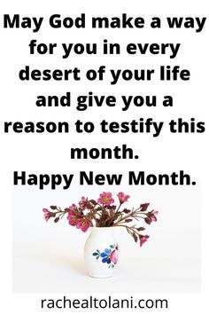 a vase filled with pink flowers on top of a white table next to a sign that says, may god make a way for you in every desert of your life and give