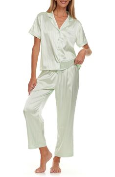 The silky construction lends easy comfort to these soft pajamas, that pair a short-sleeve button-up shirt and matching pants with a striped pattern. 25" top length; 10 1/2" front rise; 13 3/4" back rise (size Medium) Top has front button closure; notched collar; short sleeves Pants have elastic/drawstring waist 100% polyester Hand wash, dry flat Imported Striped Short Sleeve Sets For Spring, Bridesmaid Pajamas, Button Up Pajamas, Flora Nikrooz, Bridesmaid Pyjamas, Soft Pajamas, Satin Pajamas, Matching Pants, Contemporary Outfits