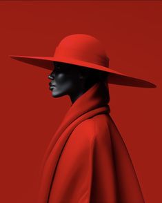 a mannequin wearing a red coat and hat with a black face on a red background