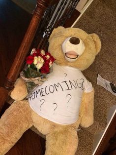 a teddy bear with a t - shirt that says, home coming? on it