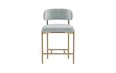 an upholstered bar stool with a light blue velvet seat and gold metal frame