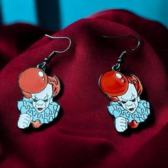 Step into the world of thrills and chills with these eye-catching creepy clown earrings! Perfect for horror enthusiasts and Halloween lovers, these earrings feature a vibrant and detailed clown design that captures the essence of spooky fun. Lightweight and easy to wear, they add a bold statement to any outfit. Dare to stand out and embrace the eerie charm of these unique clown earrings--perfect for adding a touch of playful terror to your collection! Clown Earrings, Clown Design, Halloween Lovers, Creepy Clown, Colorado Springs, Jewelry Earrings Dangle, Springs, Etsy Earrings, Dangle Drop Earrings