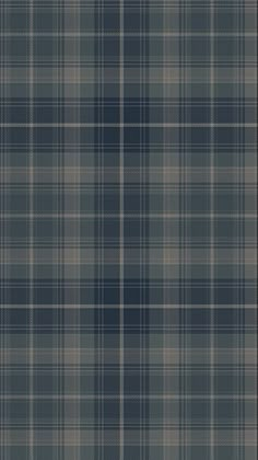 a blue and grey plaid fabric with small squares