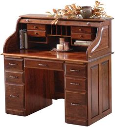 a wooden desk with drawers and a vase on top