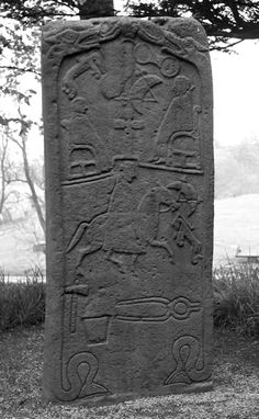 an old stone monument with writing on it