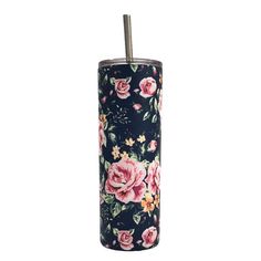 a blue and pink floral tumbler with a straw in it