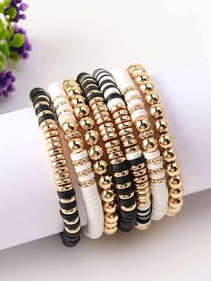 several different types of bracelets on top of each other