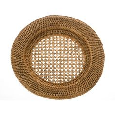 a round wicker placemat on a white background