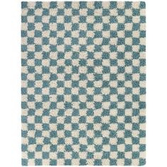 a blue and white rug with checkered pattern on the bottom, it is very soft