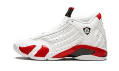 a white and red sneaker with black accents on the upper part of the shoe