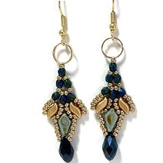 "The beautiful blue and gold dangle earrings, fit for casual outfits and evening occasions.  They upgrade any outfit. These statement earrings are chic and fun and perfect as a gift to yourself or to someone you love.    The blue and gold dangle drop earrings are beaded with Czech beads and Miyuki seed beads. The earrings are attached to a gold-plated brass fishhook. ♦ 𝗨𝗽𝗴𝗿𝗮𝗱𝗲 𝘆𝗼𝘂𝗿 𝗷𝗲𝘄𝗲𝗹𝗿𝘆 𝗰𝗼𝗹𝗹𝗲𝗰𝘁𝗶𝗼𝗻 𝘄𝗶𝘁𝗵 𝘁𝗵𝗶𝘀 𝗯𝗲𝗮𝘂𝘁𝗶𝗳𝘂𝗹 𝗲𝗮𝗿𝗿𝗶𝗻𝗴𝘀 ♦ ♦ 𝗧𝗵𝗼𝘂𝗴𝗵𝘁𝗳𝘂𝗹𝗹𝘆 𝗽𝗮𝗰𝗸𝗮𝗴𝗲𝗱 𝗶𝗻 𝗮 𝗴𝗶𝗳𝘁 𝗯𝗼𝘅 ♦ ✧ 𝗠𝗘𝗔𝗦𝗨𝗥𝗘𝗠𝗘𝗡𝗧𝗦 ✧ Total length: 2.56\" (6.5 cm) Width: 0.63'' (1.6 cm) For more dangle earrings click here: https://www.etsy.com/shop/liorajewelry?ref=seller-platform-mcnav§ion_id=19059124 For more jewelry designs visit my shop: ht Gold Beaded Drop Earrings, Handmade Elegant Long Drop Beaded Earrings, Elegant Handmade Long Drop Beaded Earrings, Handmade Elegant Beaded Earrings, Blue Gold Beaded Drop Earrings, Blue Earrings With Gold Beads, Elegant Handmade Blue Linear Earrings, Elegant Blue Beaded Earrings For Party, Elegant Blue Linear Earrings For Party