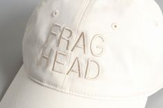 DESCRIPTION  Calling all FRAG HEADS! With a cream-on-cream colorway, embroidered declaration of fragrance fandom, and perfect dad hat fit, it’s easy to see why The Cap has been a summertime staple for us. It's crafted from lightweight 100% cotton for comfort and includes an adjustable fastener with a metal clasp and tonal under-peak lining for a perfect fit. DETAILS & CARE Low profile six panel cap, curved peak. Lightweight 100% cotton. Adjustable fastener with metal clasp. One size fits all. Beige Summer Hats With Embroidered Logo, Trendy Cream Baseball Cap With Curved Brim, Casual Cream Cotton Trucker Hat, Trendy Beige Dad Hat For Summer, Trendy Beige Cotton Dad Hat, Adjustable Cream Hat With Embroidered Logo, Summer Dad Hat With Embroidered Logo And Flat Brim, Cream Cotton Baseball Cap With Embroidered Logo, Summer Baseball Cap With Embroidered Logo And Flat Brim