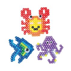 three different types of beaded toys on a white background, one with an octopus and the other with fish eyes