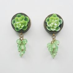 Handcrafted, succulent inspired dangle plugs for stretched ears, custom-sized and designed using gold polymer clay and other mixed media.  *Due to the natural properties of clay, our tunnels and plugs may run slightly larger. We recommend sizing down if needed for the perfect fit.* Elegant Green Plug Earrings For Wedding, Elegant Green Plug Earrings For Gift, Handmade Green Bohemian Plug Earrings, Unique Green Plug Earrings, Yellow Gold-plated Dangle Plug Earrings, Dangle Plugs, String Of Pearls, Tunnels And Plugs, Stretched Ears