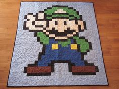 a quilt made to look like an old video game character