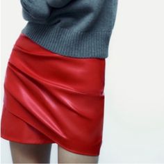 Absolutely Beautiful True Red Color, Concealed Zipper, Wrap Style With Ruching To Front Outer Shell Base Fabric 100% Polyester Coating 100% Polyurethane Chic Faux Leather Mini Skirt For Winter, Trendy Red Mini Skirt For Work, Red Mini Skirt For Workwear In Fall, Red Mini Skirt For Fall Workwear, Chic Red Mini Skirt For Fall, Winter Faux Leather Skirt, Elegant Zara Faux Leather Skirt, Trendy Red Winter Skirt, Red Mini Skirt For Night Out In Fall