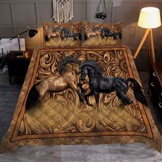 two horses are playing on the bed sheet set with decorative patterns and lamps in front of them