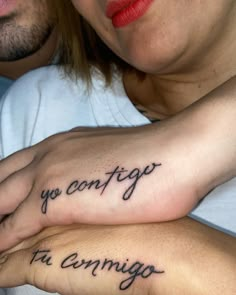 two people with tattoos on their arms that say yo configo and ta conigo