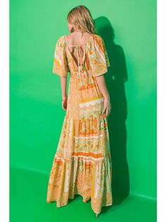 A printed woven maxi dress featuring plunging V neckline, flutter sleeve, waist yoke, tiered skirt, surplice back with tie and smocked back waist band. - Self: 100% Polyester Lining: 100% Polyester - Size & Fit - Model is 5`8" And Wearing Size Small - Measurements Taken From Size Small - Approx. Length: 49" Floral Bandana, Bandana Print, Tier Skirt, Printed Maxi, Tiered Skirt, Printed Maxi Dress, Waist Band, Flutter Sleeve, Smocking