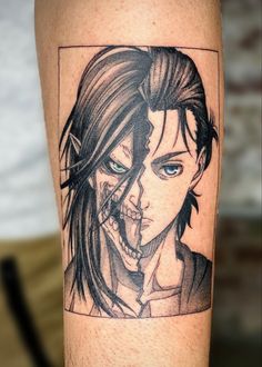 a black and white tattoo on the leg of a man with blue eyes, long hair and an evil face