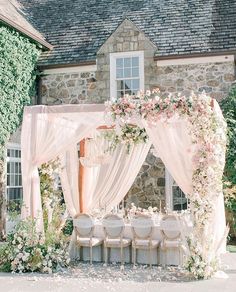 the instagram page on instagram shows an image of a wedding venue with flowers and greenery