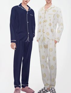 two men standing next to each other wearing pajamas and slip on shoes in front of a white background