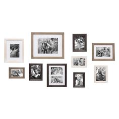 many black and white pictures are hanging on the wall