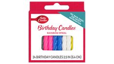 birthday candles are packaged in pink, white and blue