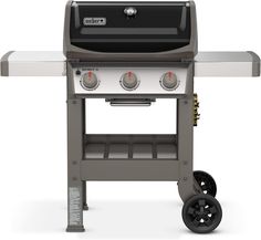 an outdoor grill with two burners and wheels