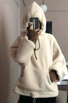 Loose Hooded Fluffy Sweatshirt – Tomscloth Casual Solid Warm Hoodie, Casual Warm Solid Color Hoodie, Casual Warm Hoodie, Casual Warm Hoodie With Long Sleeves, Warm Long Sleeve Casual Hoodie, Warm Oversized Hoodie For Winter, Oversized Warm Hoodie For Winter, Comfy Long Sleeve Sweater With Drawstring Hood, Cream Cozy Fit Long Sleeve Sweatshirt