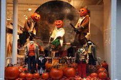 an assortment of halloween decorations in a display case