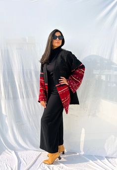 Festive Transitional Long Sleeve Outerwear, Festive Long Outerwear For Fall, Traditional Long Coat For Festive Season, Festive Long Sleeve Kaftan With Woven Motifs, Bohemian Long Sleeve Abaya For Fall, Traditional Black Long Sleeve Outerwear, Traditional Black Shawl Outerwear, Traditional Festive Outerwear For Fall, Traditional Long Sleeve Transitional Outerwear