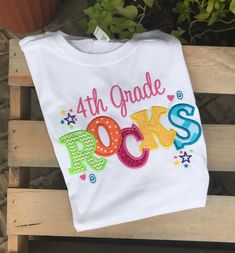 Are you a teacher and need a cute shirt? You will rock all year with this shirt! Colorful and fun! I AM CURRENTLY 2-3 WEEKS OUT ON ALL ORDERS. PLEASE MAKE SURE THIS WORKS BEFORE YOU PLACE YOUR ORDER. I use Gildan soft style - regular unisex. They do run true to size. All of my work is custom, made with care in my smoke-free home. I can do any colors you choose. If you don't specify I will choose. Just leave me the details in the order comments. Also leave the name if you want it included! Thank Personalized T-shirt For End Of School Year, Personalized Tops With School Spirit For Back To School, School Spirit Shirt With Name Print For School Events, Personalized Tops For Back To School With School Spirit, School Spirit Cotton Shirt For School Events, Cotton School Spirit Shirt For School Events, Cotton Shirt For School Events With School Spirit Style, Personalized T-shirt For School's End Of Year, Multicolor School Spirit T-shirt For School Events