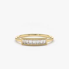 Made to Order.
Gold Kt: 14K (Please message me if you want 18K)
Custom Gold Color: Rose Gold, Yellow Gold, White Gold
Baguette Diamond: 3 pcs 2.5x1.5 MM
Total Number of Stones: 7
Total CTW: 0.35 Ctw
Diamond Color Clarity: G Color VS Clarity
Setting Type: Chanel Setting / With Milgrain
Band Width: 1.3 MM

Designed to grab attention, our luxurious baguette diamond ring will dress your hand in stunning sparkle. The handcrafted ring features a contemporary design with seven baguette diamonds in a st Gold Half Eternity Baguette Ring, Gold Baguette Ring With Half Eternity Detail, Gold Baguette Ring With Half Eternity Design, Gold Baguette Ring With Half Eternity, Gold Baguette Half Eternity Rings, 14k Gold Baguette Rings, Gold 14k Baguette Diamond Ring, Gold Baguette Ring As Gift, Yellow Gold Baguette Rings As Gift