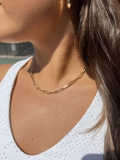 This classic chunky chain is a modern basic for every woman. We are in love with the 14K Gold Fill rectangular 'paperclip' links that can be worn on its own, layered with other necklaces, or holding your favorite charms and pendants. Includes a 2" adjustable chain for easy layering. Classic Everyday 14k Gold Filled Charm Necklaces, Everyday Chain Link Charm Necklaces, 14k Gold Filled Paperclip Chain Necklace, Everyday Yellow Gold Chain Link Charm Necklace, Everyday Oval Link Charm Necklaces With Paperclip Chain, 14k Gold Filled Paperclip Necklace With Adjustable Chain, Dainty Paperclip Chain Link Charm Necklaces, 14k Gold-filled Necklace With Adjustable Paperclip Chain, Everyday Oval Link Charm Necklace With Paperclip Chain