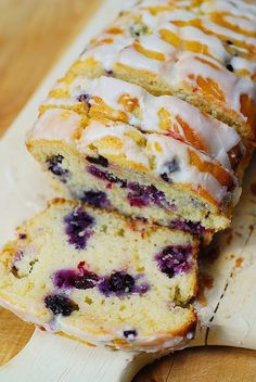 slices of lemon blueberry bread on a cutting board