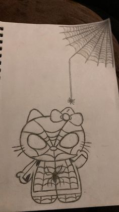 a drawing of a cat holding an umbrella on top of a sheet of white paper