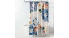 a shower curtain with colorful flowers on it