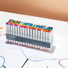 a row of crayons sitting on top of a table