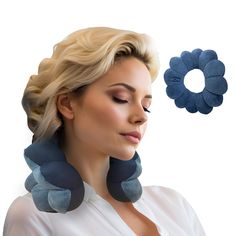 a woman with blonde hair and blue ear cushions