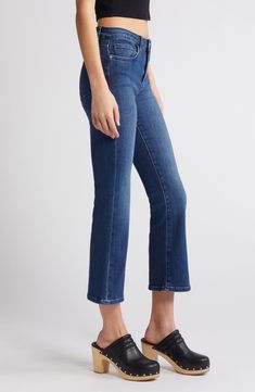 Made from premium stretch denim, these cropped jeans offer an updated take on the '70s trend with a contoured mid waist and slightly flared legs. 26 1/2" inseam, 18" leg opening; 11" front rise; 15" back rise (size 29) Zip fly with button closure Five-pocket style 77% cotton, 19% rayon, 3% elasterell-p, 1% elastane Machine wash, dry flat Imported t.b.d. Fitted Cropped Leg Flare Jeans, Boot Jeans, T B, Cropped Jeans, Jeans And Boots, Stretch Denim, Cold Weather, Mid Rise, Nordstrom