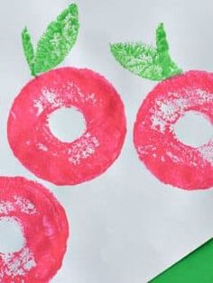 an art project for kids to make with paper and colored crayons on white paper