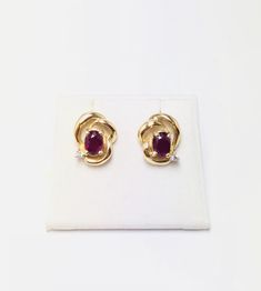 Beautiful Vintage 14k Yellow Gold Natural Ruby Diamond Earrings 100% Genuine Diamonds and Natural Ruby Ruby(s) 1.60CT Diamond(s) 0.10CT Color: G Clarity: SI2 Total Earrings Weight: 4.8GR 14K Yellow Gold For more information regarding this item feel free to reach me so I can accommodate your needs. Thank you Yellow Gold Gemstone Cluster Earrings, 14k Gold Cluster Earrings For Anniversary, Fine Jewelry Style, 14k Gold Cluster Earrings For Anniversary, Formal Gold Cluster Earrings With Gemstone, Gold Gemstone Cluster Earrings For Formal Occasions, Formal Yellow Gold Cluster Earrings, Oval 14k Gold Earrings With 17 Jewels, Formal Oval Earrings Stamped 14k, 14k Gold Gemstone Earrings For Anniversary