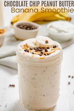 chocolate chip peanut butter banana smoothie in a mason jar with whipped cream and chocolate chips