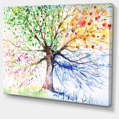 an abstract painting of a tree with colorful leaves and branches on the bottom half of it