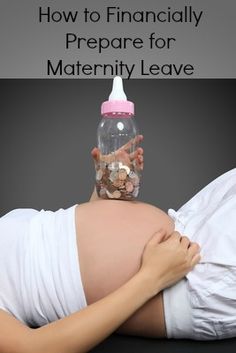 a pregnant woman laying on the ground with her head in a bottle over her belly